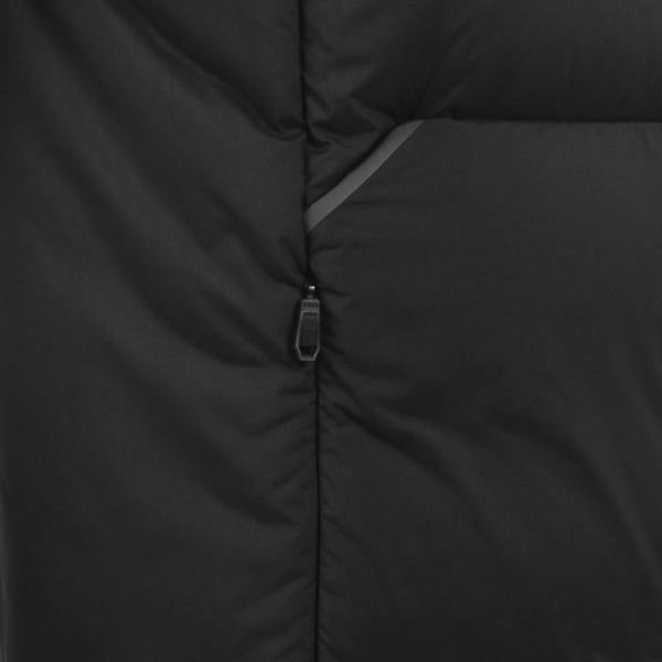 Close-up of a black BOSS Urbanex puffer gilet featuring quilted fabric and a branded zipper pull on a side pocket.