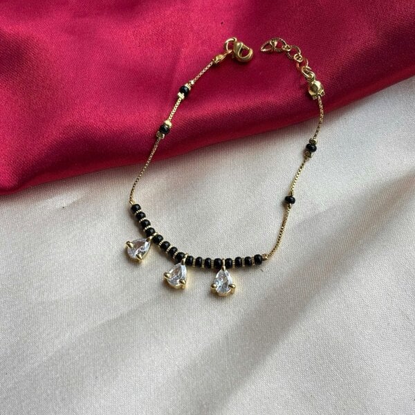 The Colourful Aura Black Bead Mangalsutra Zircon drop gold nazar Bracelet