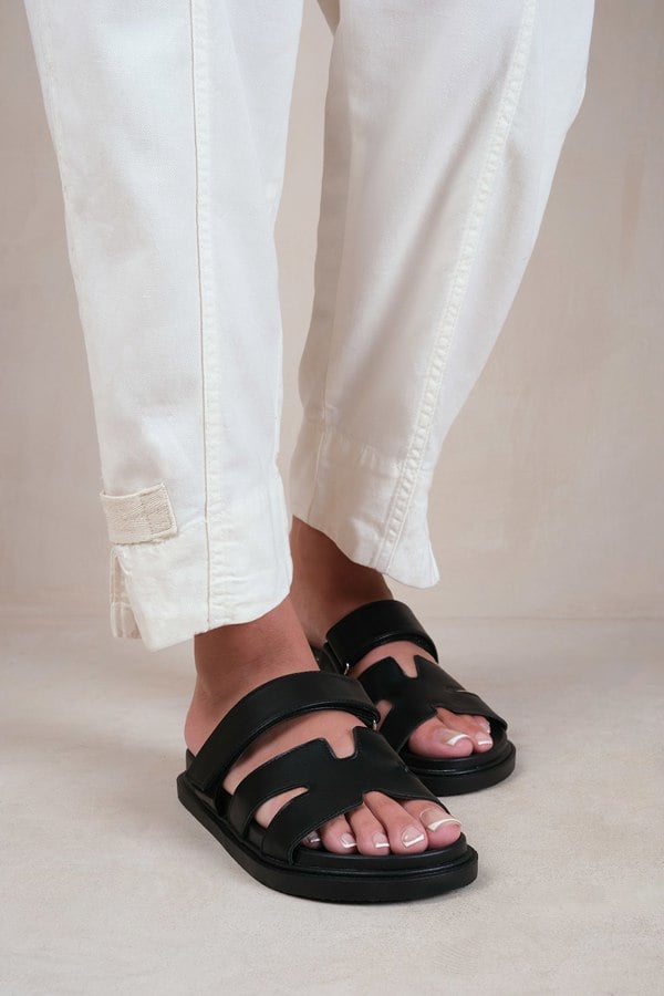 Where's That From Adagio Strappy Sandals in Black Faux Leather