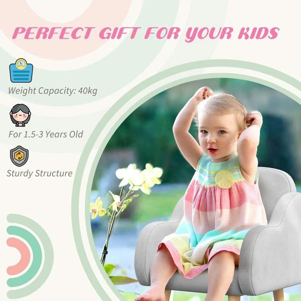 Grey kids armchair with armrests and light wood legs, child seated