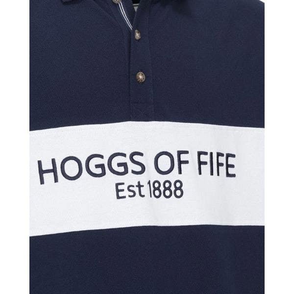 Close-up of Hoggs of Fife Stewart polo shirt showing detailed crest embroidery and soft cotton fabric for countryside styling