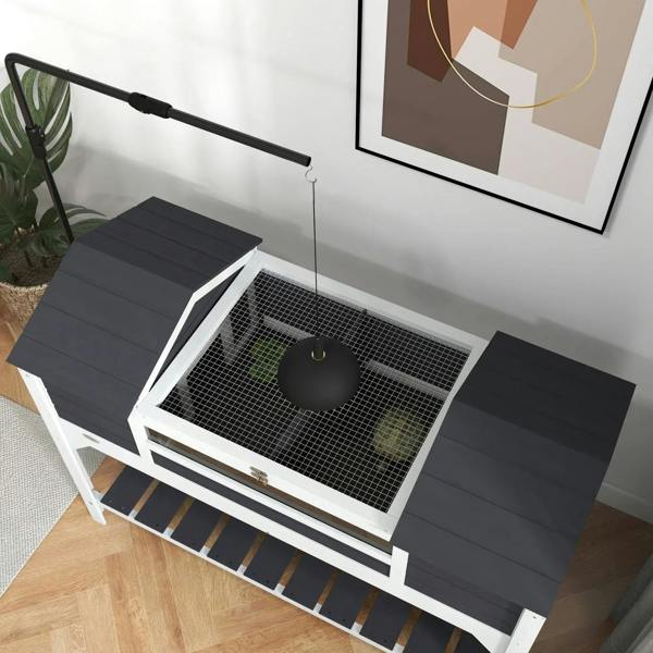 Open-topped tortoise enclosure with mesh divider and adjustable lamp holder