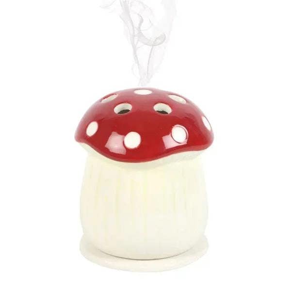 Mushroom incense cone holder with red cap and cream base, open for incense cones