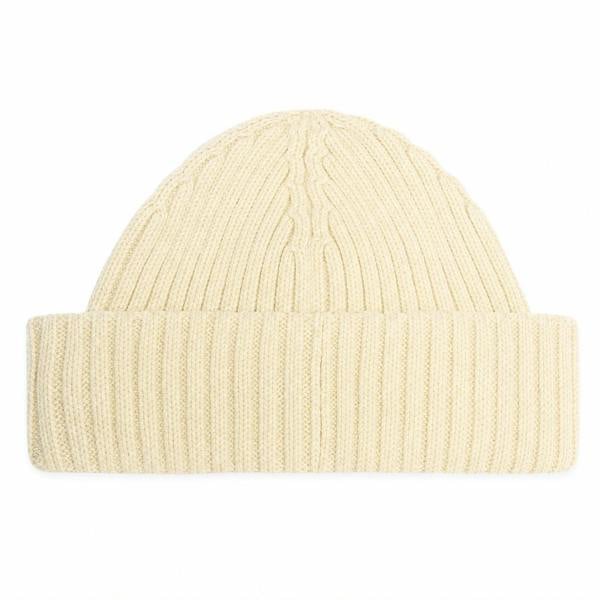 Barbour International Dufton fisherman beanie in chalk off-white, featuring a chunky ribbed knit design with a folded cuff.