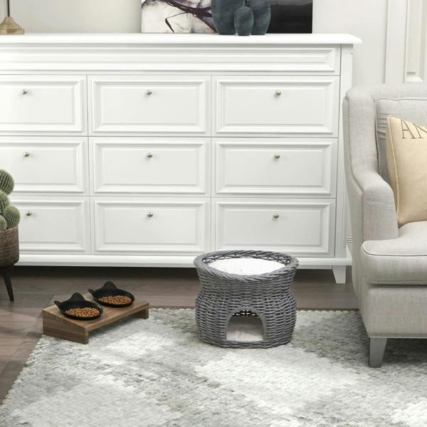 Small grey woven wicker cat bed with arched entrance for pets