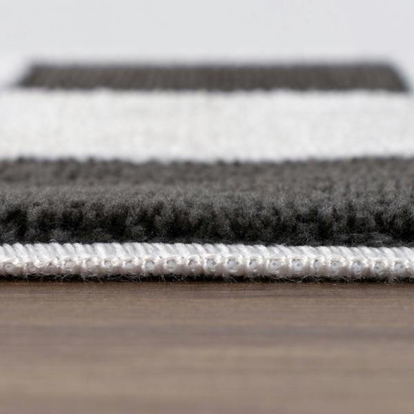 Loft Checkerboard Dark Grey Rug Easy to hoover.