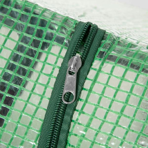 Green PE cover zipper with metal pull on a mini greenhouse frame