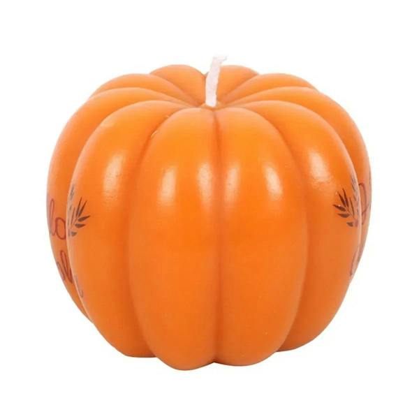 Orange pumpkin-shaped candle with ridged segments and small top wick