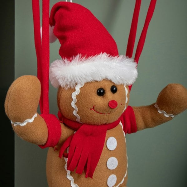 Samuel Alexander 57cm Battery Operated Musical Parachuting Gingerbread Man with Leg Kicking Motion