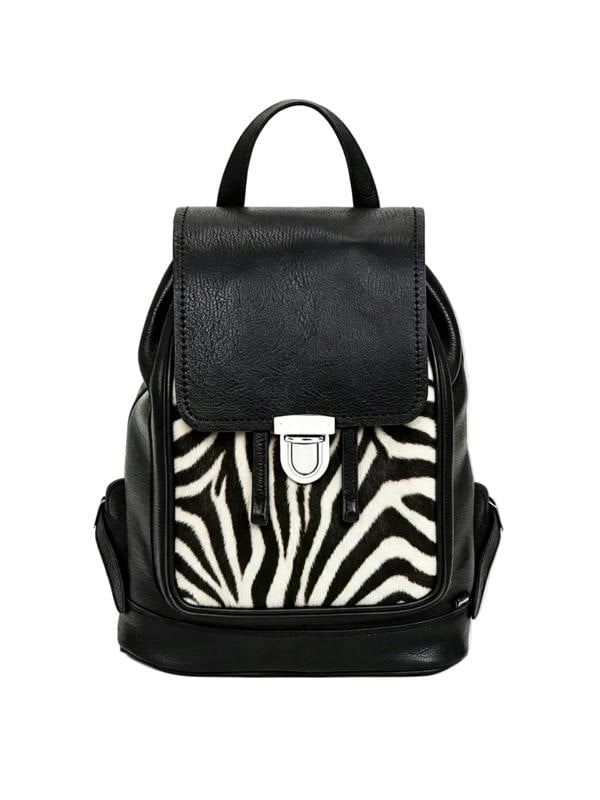 a black leather backpack with a zebra print patterned front on a plain white background