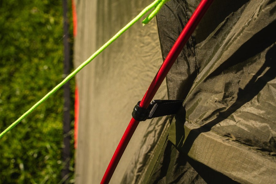 The Beckford Lightweight 2 Person Tent 's red anodised poles & brightly coloured guy lines.