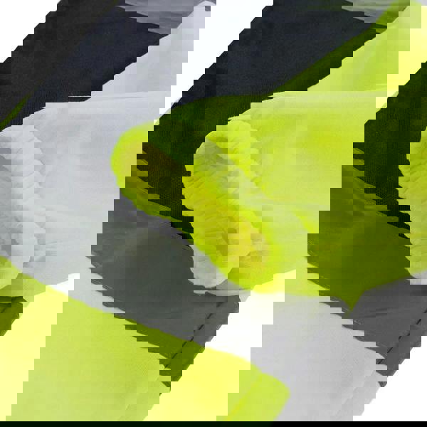 Scruffs High Visibility Mens Hi Viz Trade Workwear Trade Joggers, close-up of bright yellow high visibility fabric with reflective strip and black and gray durable material.