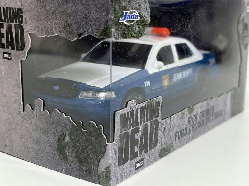 a toy car in a box