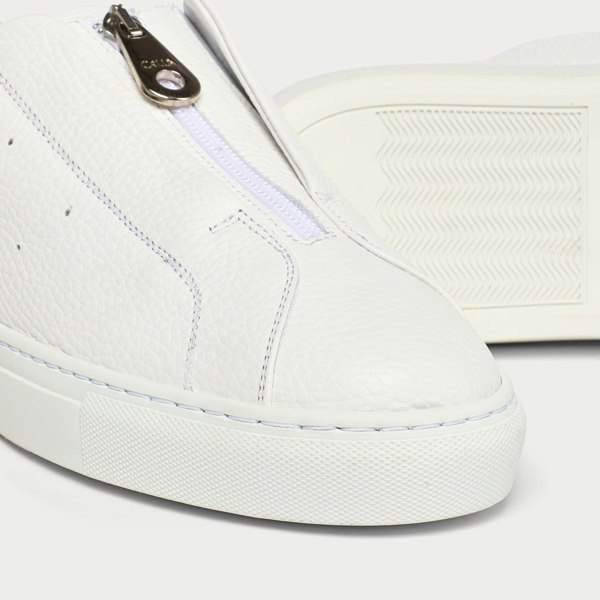 Estella white sneakers tip close up