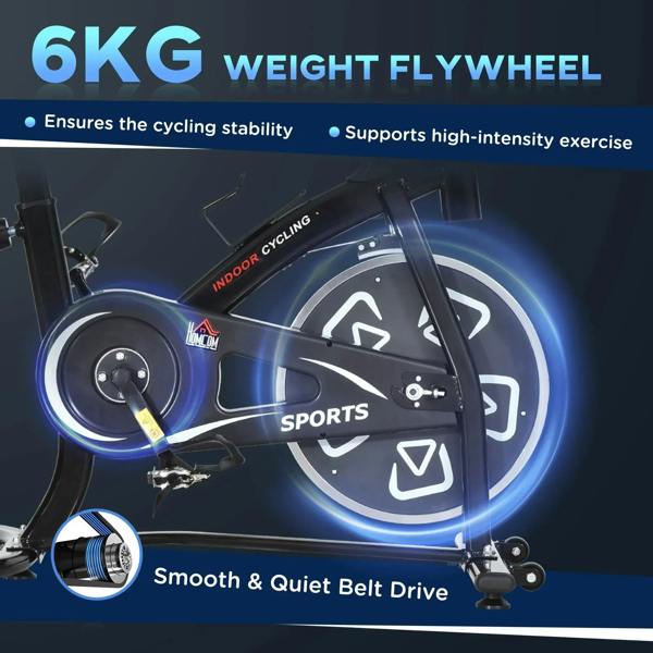 Front flywheel and belt-drive area of a black indoor stationary bike