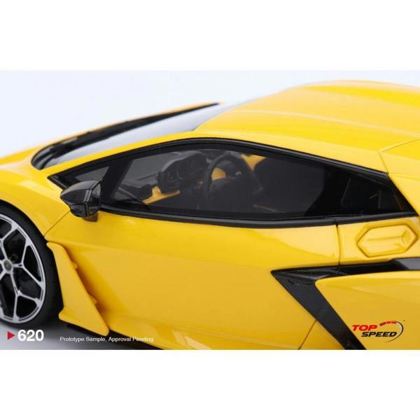 a yellow sports car with black trim