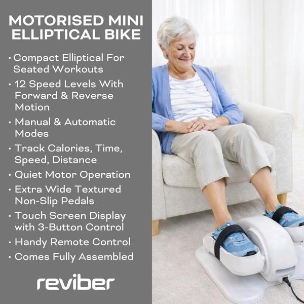 An older woman sits on a chair using the Reviber Motorised Mini Elliptical Bike for low-impact leg exercise. Features like multiple speed levels, touch screen, remote control, and textured pedals are listed beside her. Brand: Reviber.