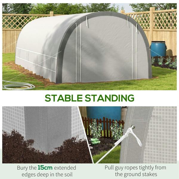White polytunnel greenhouse with staked base and guy ropes for stable standing
