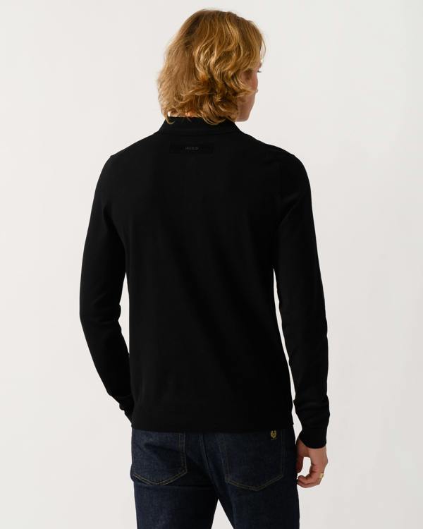 back of model wearing a HUGO San Pippo Mens Slim-fit knit polo with rear logo in Black 001