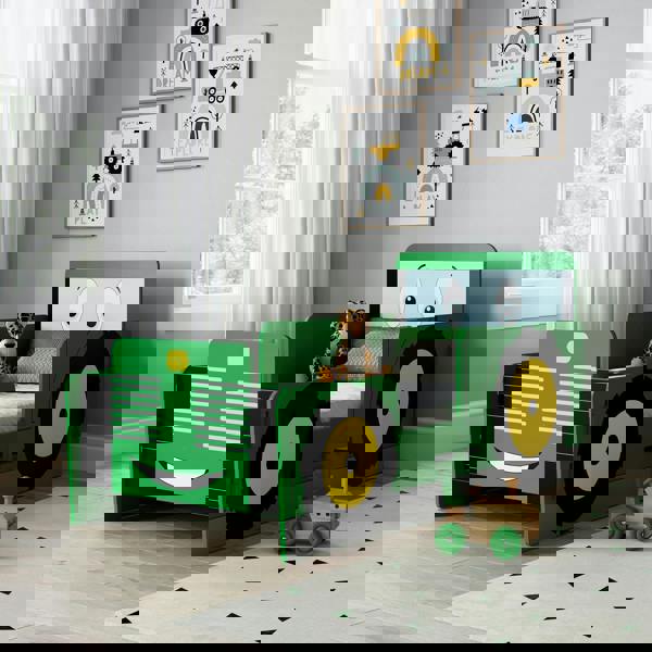 Toddler bed in a modernly decorated bedroom.