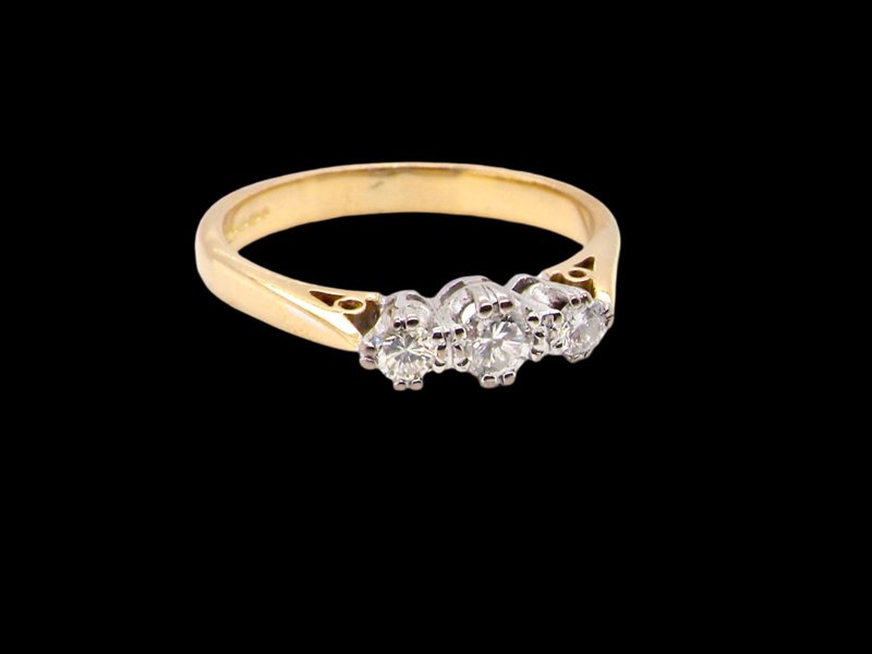 Vintage Tom A traditional three stone diamond ring