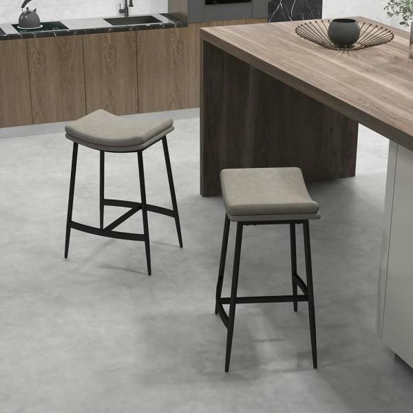 Grey bar stools with curved seats and black steel frames