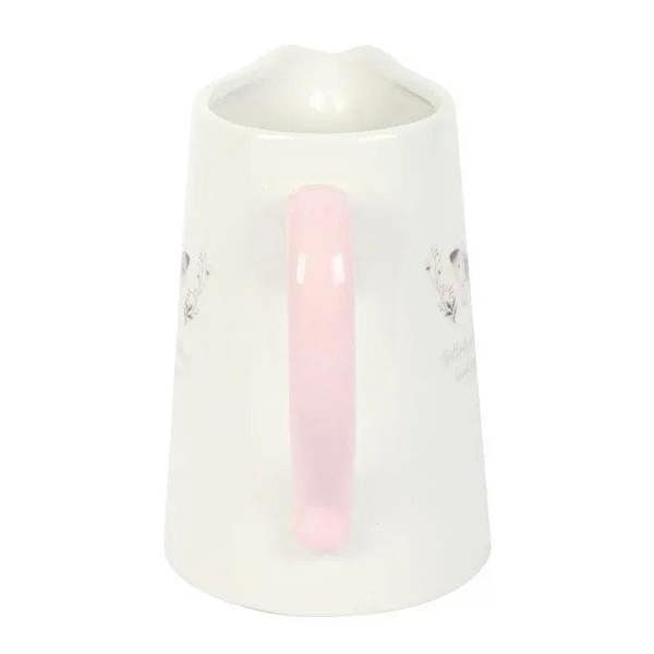 White ceramic flower jug with pink handle, butterfly side print and pink glaze stripe