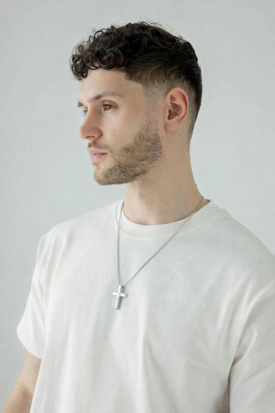 SVNX Cross Pendant Necklace in Silver