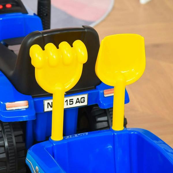 Yellow horn on a blue toddler tractor ride-on walker with black seat