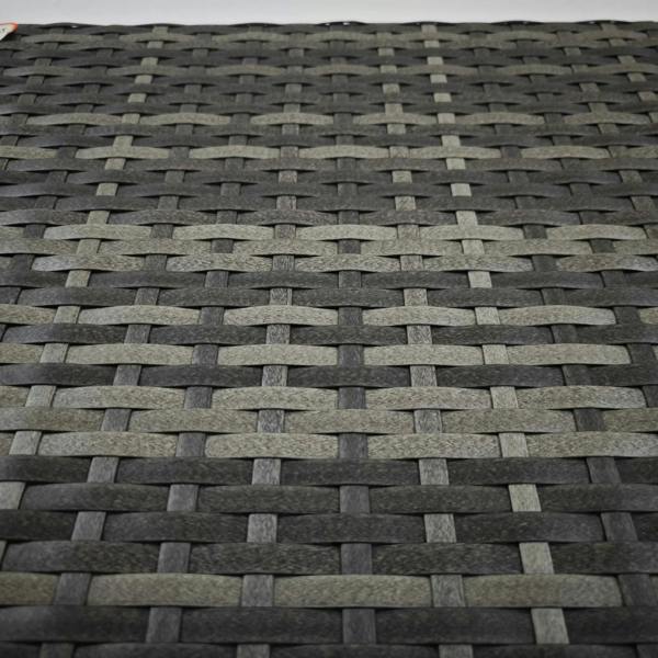 Close-up of the grey rattan weave pattern on a folding side table top