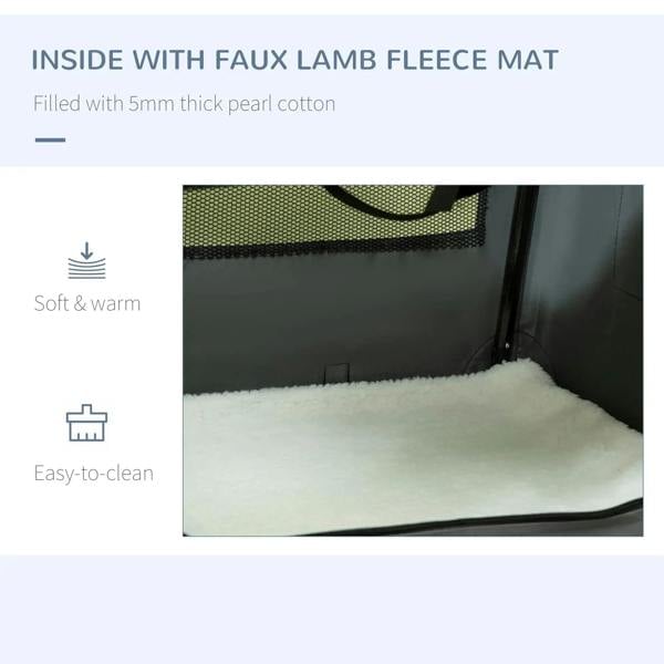 Close-up of grey pet carrier cushion panel and carry strap near the edge