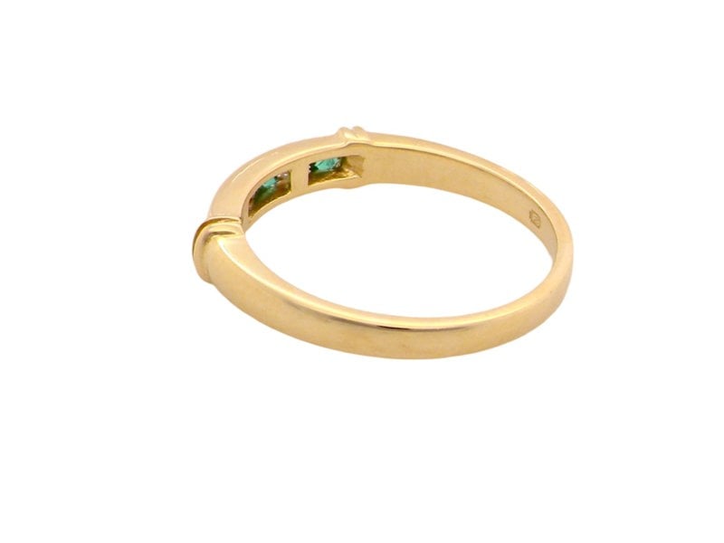 Vintage Tom An 18 carat gold Emerald and Diamond Eternity ring