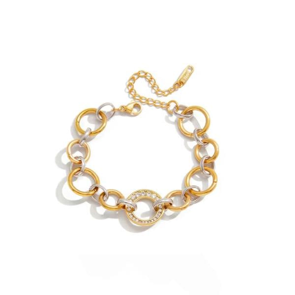 Gold and white chain bracelet on a white background