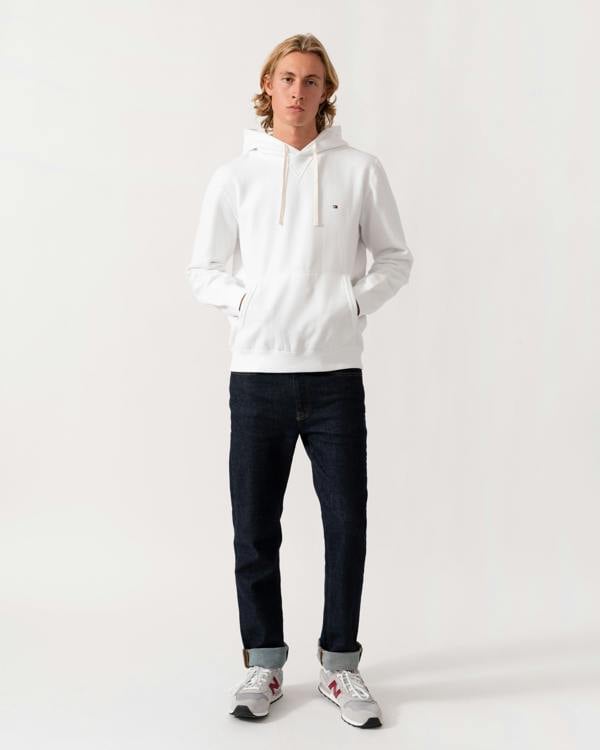 Man wearing the Tommy Hilfiger Essential Fleece Mens Hoodie - White