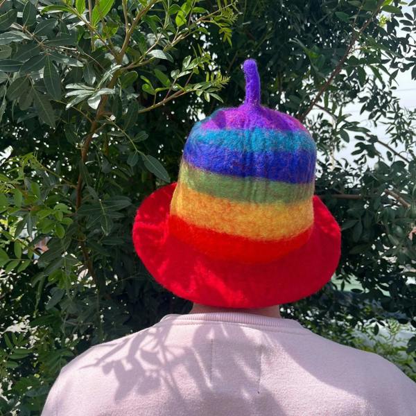 Rainbow felt sauna bowl hat with purple, blue, green, yellow, and red bands