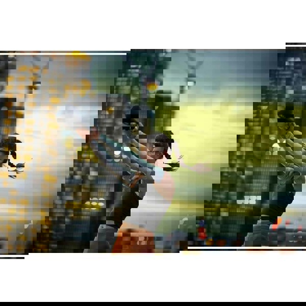 Woman swinging an adidas 12kg kettlebell