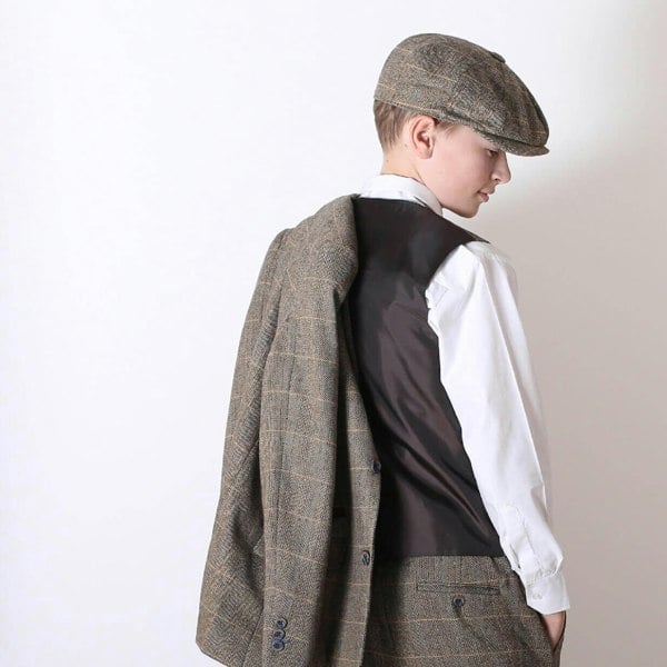 Boy wearing suit and matching hat