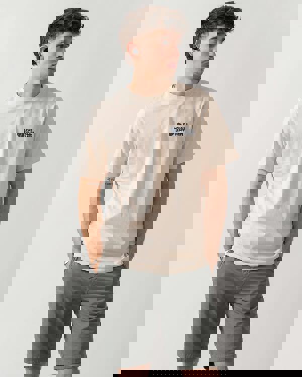 studio shot of a model wearing a Fjallraven Swedish Forest Mens T-Shirt in Chalk White 113