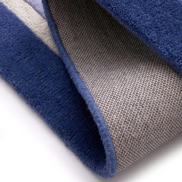 Close-up of a blue and gray textured fabric sample