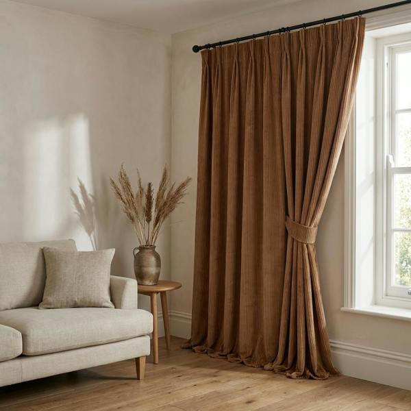 Larissa made-to-measure curtains in Glow, styled in a living room