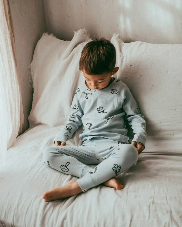 Boy wearing unisex organic cotton kids long-sleeve top