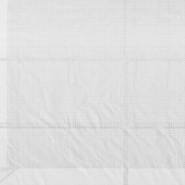 Close-up of translucent white PE greenhouse mesh panel with visible grid texture