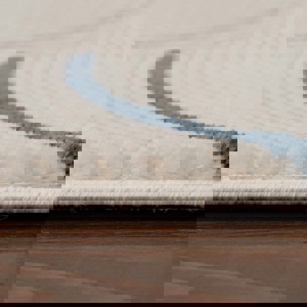 Living Room rug, blue-cream colours, geometric, practicality in mind, the rug is anti-allergic.