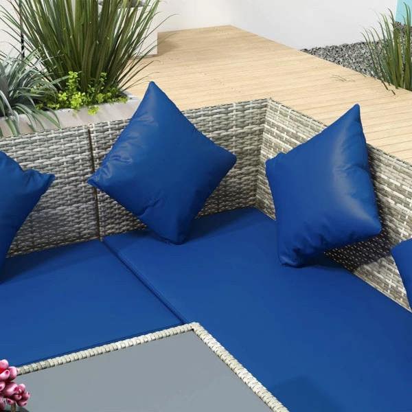 Rattan outdoor sofa set with dark blue seat and back cushions