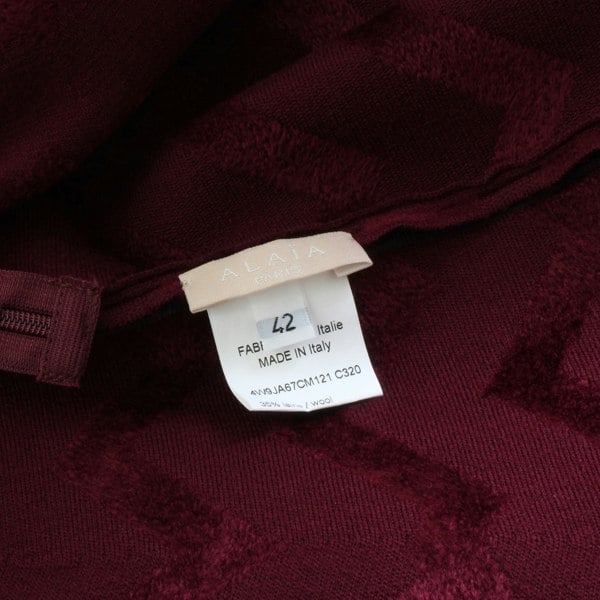 Alaia circular skater skirt in claret velvet with chevron patterning