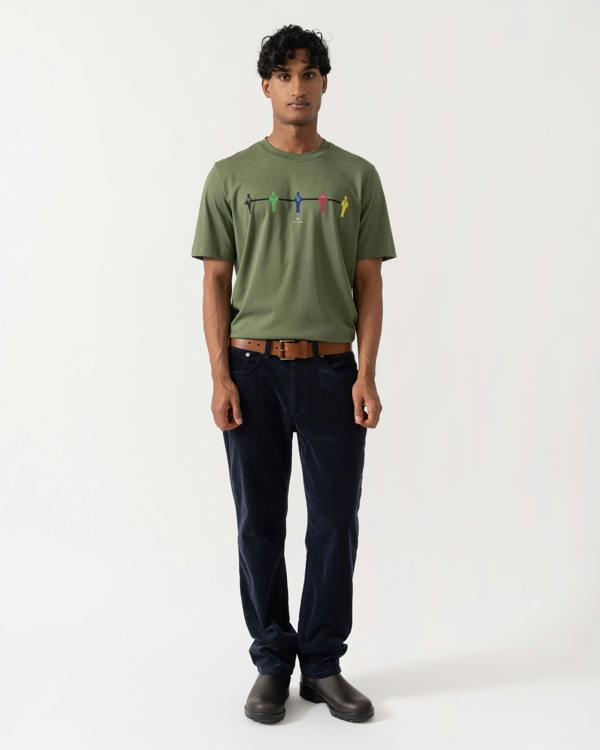 Man wearing GANT Mens Regular Fit Cord Jeans - 433 Evening Blue