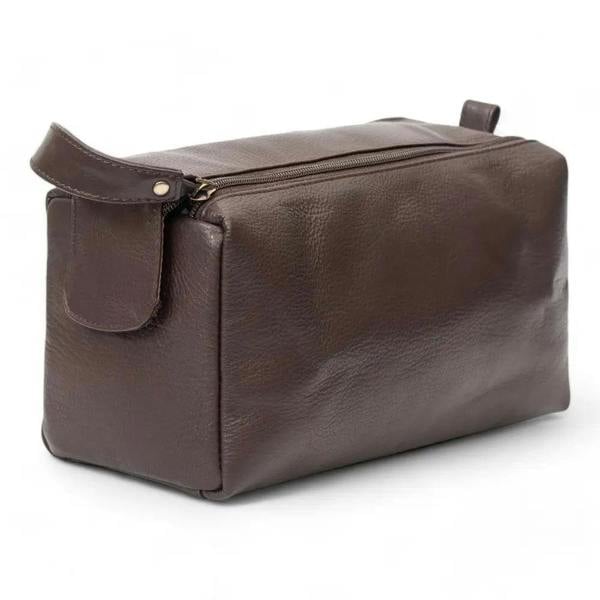 Brown leather toiletry bag on a white background