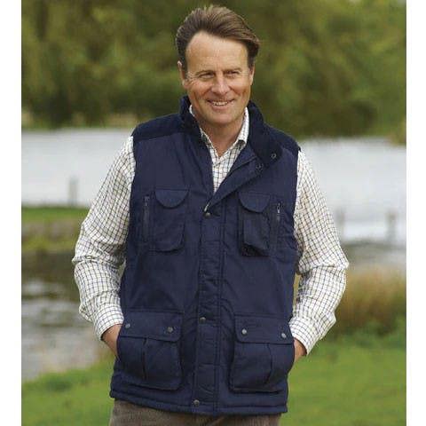 Man wearing Navy Champion Exmoor bodywarmer in the countryside
