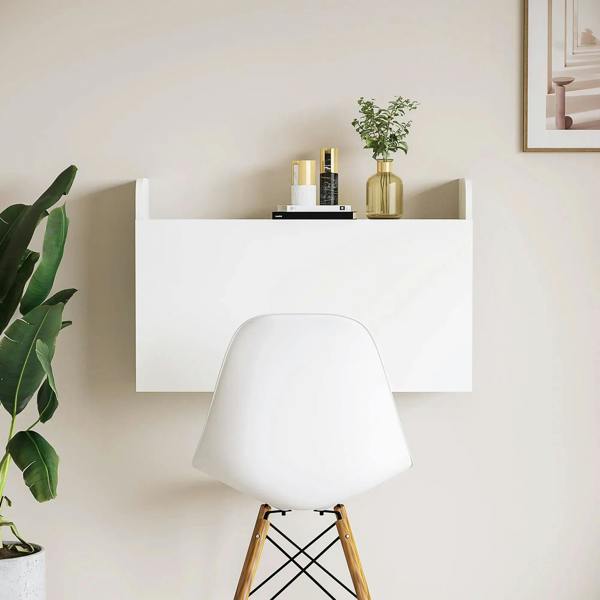White wall-mounted drop-leaf desk with shelf above a compact tabletop, minimal design