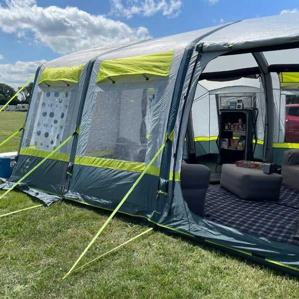 An image of the OLPRO Home 5 Berth Inflatable Tent from outside pitched on a campsite.